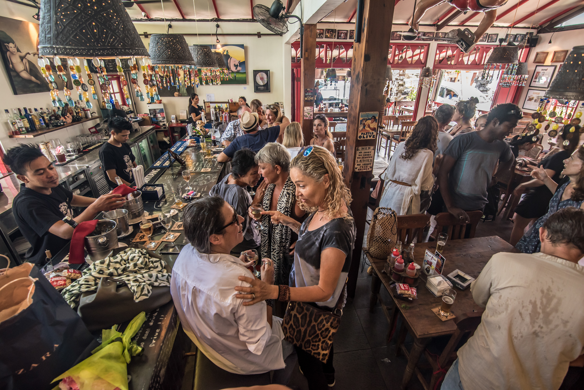 A lively crowd enjoying drinks at the Hog Wild bar in Bali